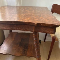 1910's Solid Oak Table With Iron Claw & Ball Foot -chairish shop 1910s solid oak table with iron claw and ball foot 6471 scaled