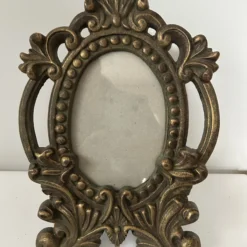 1940's Gold Cast Iron Oval Picture Frame -chairish shop 1940s gold cast iron oval picture frame 0027 scaled