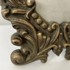 1940's Gold Cast Iron Oval Picture Frame -chairish shop 1940s gold cast iron oval picture frame 8317 scaled