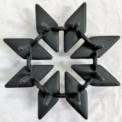 1960's Jens H Quistgaard For Dansk Cast Iron Candle Holder -chairish shop 1960s jens h quistgaard for dansk cast iron candle holder 0073 scaled