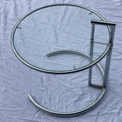 1970's Eileen Gray E 1027 Style Tubular Chrome Adjustable Accent Table -chairish shop 1970s eileen gray e 1027 style tubular chrome adjustable accent table 8164 scaled