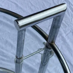 1970's Eileen Gray E 1027 Style Tubular Chrome Adjustable Accent Table -chairish shop 1970s eileen gray e 1027 style tubular chrome adjustable accent table 8352 scaled