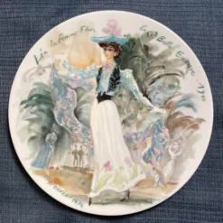 1970’s Limoges Plates - Fashion - Les Femmes Du Siecle Henri D'Arceau Women Of The Century Collector Plates - Set Of 8 -chairish shop 1970s limoges plates fashion les femmes du siecle henri darceau women of the century collector plates set of 8 5563 scaled