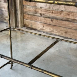 1970’s Regency Faux Bamboo Gilded Metal Three Tiered Console -chairish shop 1970s regency faux bamboo gilded metal three tiered console 2877 scaled