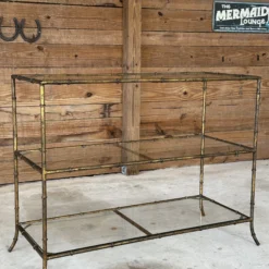 1970’s Regency Faux Bamboo Gilded Metal Three Tiered Console -chairish shop 1970s regency faux bamboo gilded metal three tiered console 7347 scaled