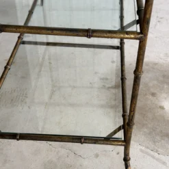 1970’s Regency Faux Bamboo Gilded Metal Three Tiered Console -chairish shop 1970s regency faux bamboo gilded metal three tiered console 9159 scaled