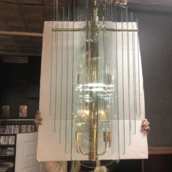 1980's Postmodern Glass And Brass Swag Chandelier -chairish shop 1980s postmodern glass and brass swag chandelier 0595 scaled