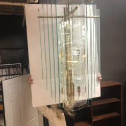 1980's Postmodern Glass And Brass Swag Chandelier -chairish shop 1980s postmodern glass and brass swag chandelier 0713 scaled