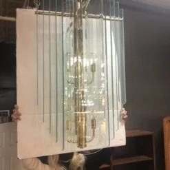 1980's Postmodern Glass And Brass Swag Chandelier -chairish shop 1980s postmodern glass and brass swag chandelier 5221 scaled