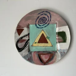 1980's Postmodern Larry H. Hand Painted Wall Art Plates - A Pair -chairish shop 1980s postmodern larry h hand painted wall art plates a pair 4941 scaled