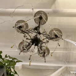 1990's Gabriela Crystal + Wrought Iron Five Light Chandelier -chairish shop 1990s gabriela crystal wrought iron five light chandelier 0589