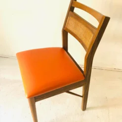 70's Midcentury Orange Vinyl Seat Cane Back Side/ Desk Chair -chairish shop 70s midcentury orange vinyl seat cane back side desk chair 1807 scaled