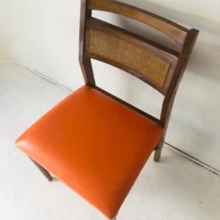 70's Midcentury Orange Vinyl Seat Cane Back Side/ Desk Chair -chairish shop 70s midcentury orange vinyl seat cane back side desk chair 3779 scaled