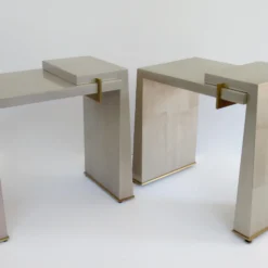 C.1990's Thomas Pheasant(Designer) For Baker Furniture Co. Platinum Silver Leaf & Bronze Modernist "Stratum" Side/Occ. Tables -Pair -chairish shop c1990s thomas pheasantdesigner for baker furniture co platinum silver leaf and bronze modernist stratum sideocc tables pair 6966 scaled