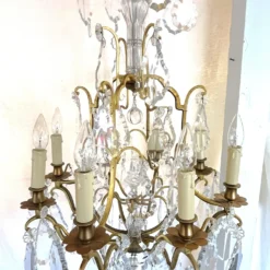 Early 1900's French Louis Xv Style Brass And Crystal Pendeloques 8-Light Chandelier -chairish shop early 1900s french louis xv style brass and crystal pendeloques 8 light chandelier 5620 scaled