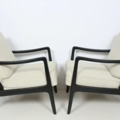 Early Ole Wanscher Ebonized Mahogany Lounge Chairs, 1950's - A Pair -chairish shop early ole wanscher ebonized mahogany lounge chairs 1950s a pair 0540 scaled