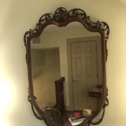 Vintage 1940's Mahogany Shield Mirror -chairish shop vintage 1940s mahogany shield mirror 0050 scaled