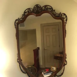 Vintage 1940's Mahogany Shield Mirror -chairish shop vintage 1940s mahogany shield mirror 2449 scaled