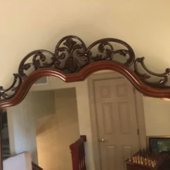 Vintage 1940's Mahogany Shield Mirror -chairish shop vintage 1940s mahogany shield mirror 4857 scaled