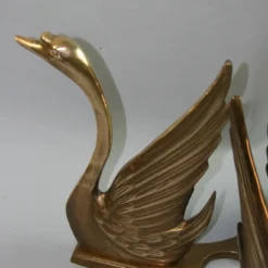 Vintage 1970's Hollywood Regency Glass Top Coffee Table With Solid Brass Swan Base -chairish shop vintage 1970s hollywood regency glass top coffee table with solid brass swan base 1371